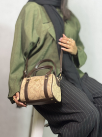 خرید  کیف صندوقی دخترانه کرم با نوشته کاراملی کوچ coach 