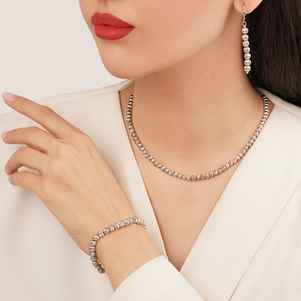 خرید سرویس زنانه ژوپینگ  نقره ای توپی تراش دار 