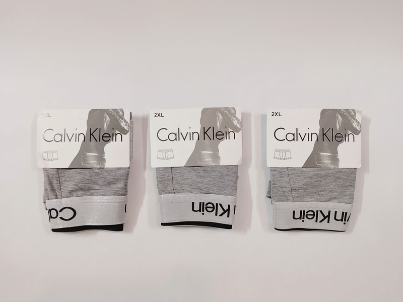 شورت مردانه نیمپا کلوین کلاین (Calvin Klein) رنگ طوسی ملانژ – پک ۳ عددی سایز بزرگ 2XL و 3XL