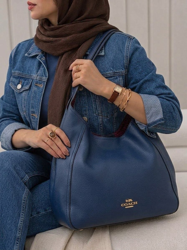 خرید  کیف دوشی دخترانه طرح کوچ سرمه ای 