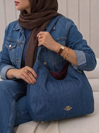 خرید  کیف دوشی دخترانه طرح کوچ جین 
