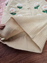 ژاکت بافت طرح گل بابونه