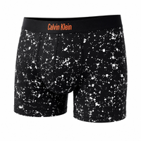 خرید شورت پادار مردانه تمام چاپ Calvin Klein مدل اسپرت لکه‌ای مشکی 