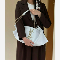 کیف دوشی چرم YSL مدل ترند با بند زنجیری