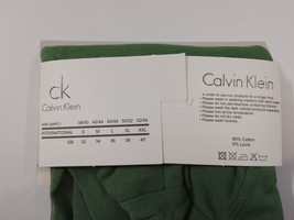 شورت مردانه نیم‌پا کلوین کلاین (Calvin Klein) رنگ سبز زیتونی – پک ۳ عددی سایز بزرگ 2XL و 3XL